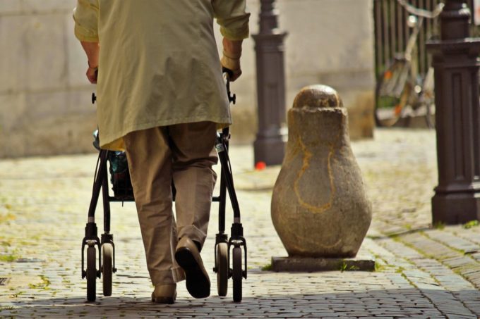 man pushing a cart 2